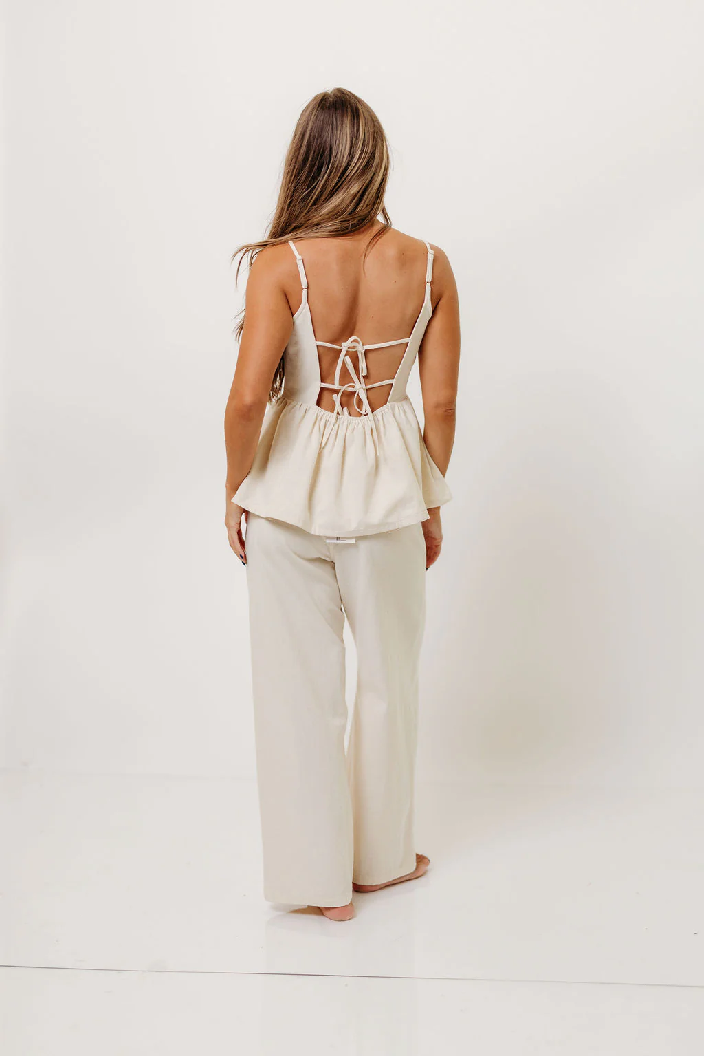 Keira 100% Cotton Bow Trim Peplum Top in Cream - Image 5