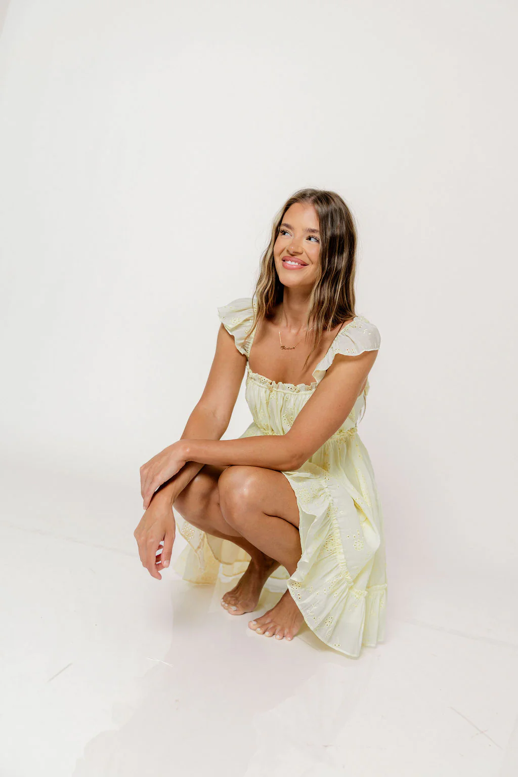 Chelsea Eyelet Mini Dress in Yellow - Image 9
